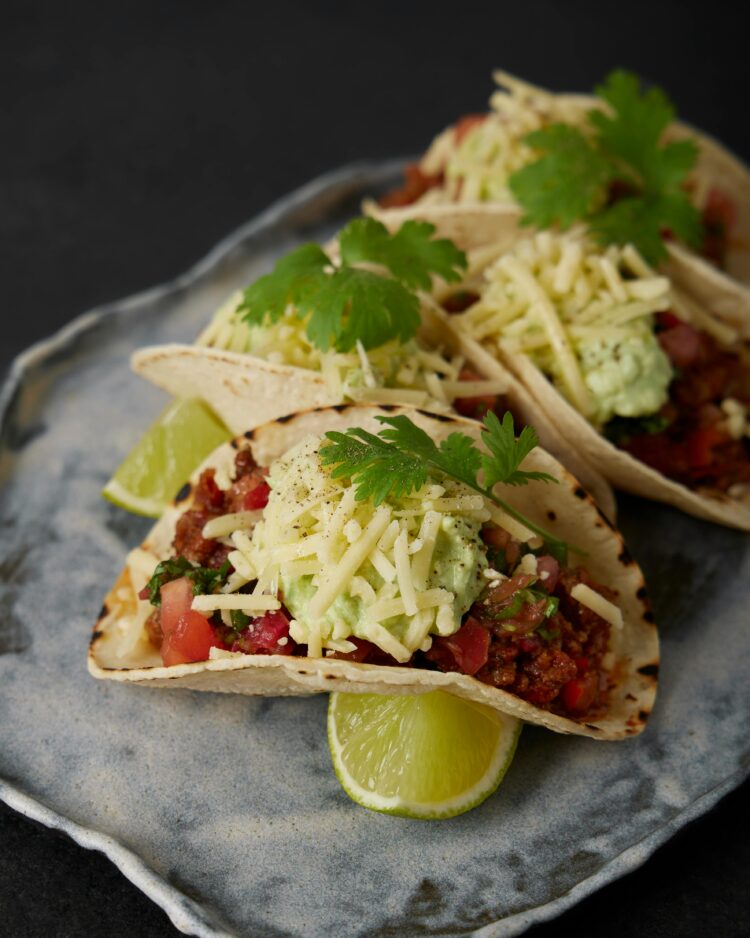 Delicious Oyster Mushroom Tacos placed on a steel plate